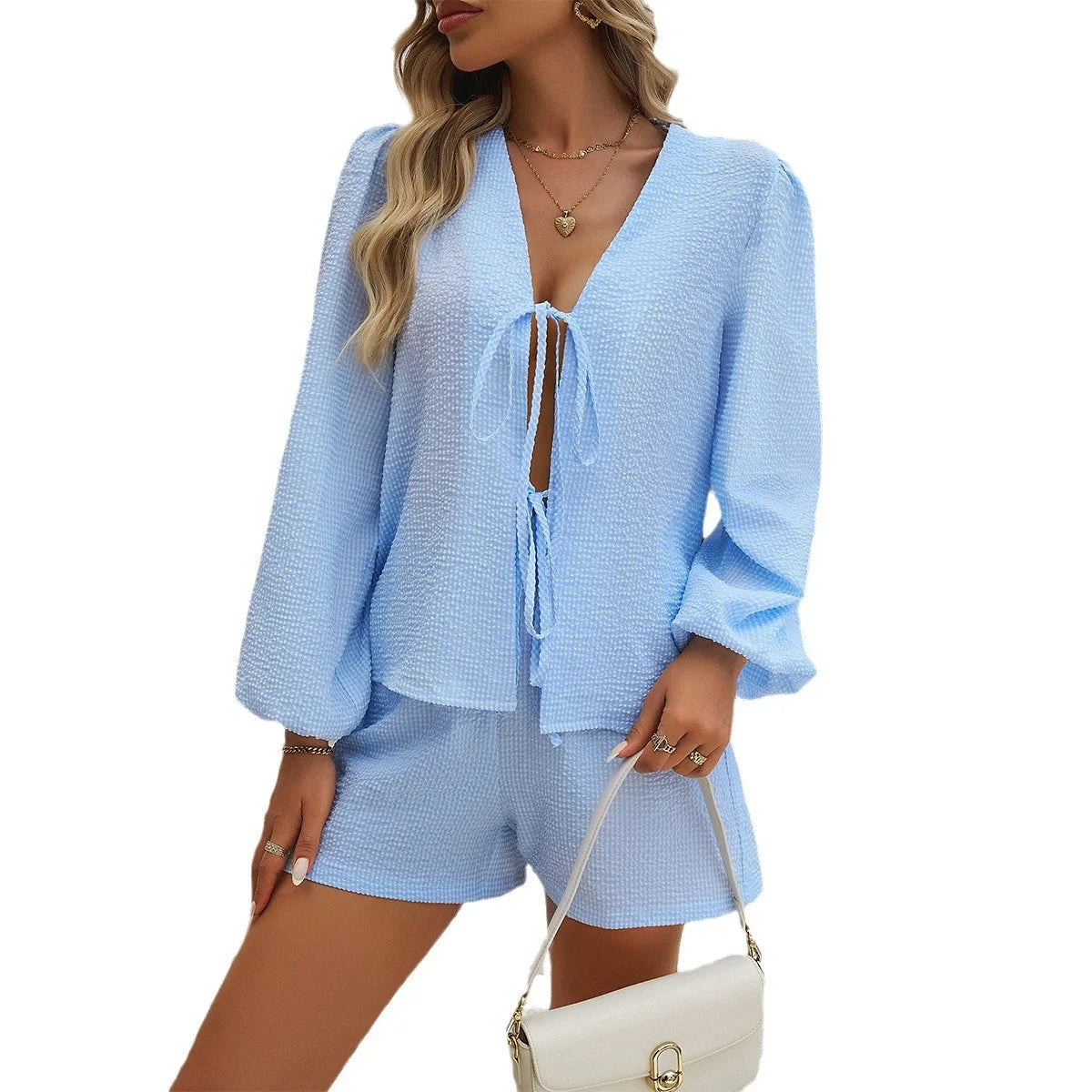 Europe and the new autumn and winter fashion women's casual loose striped cardigan long sleeve shorts suit